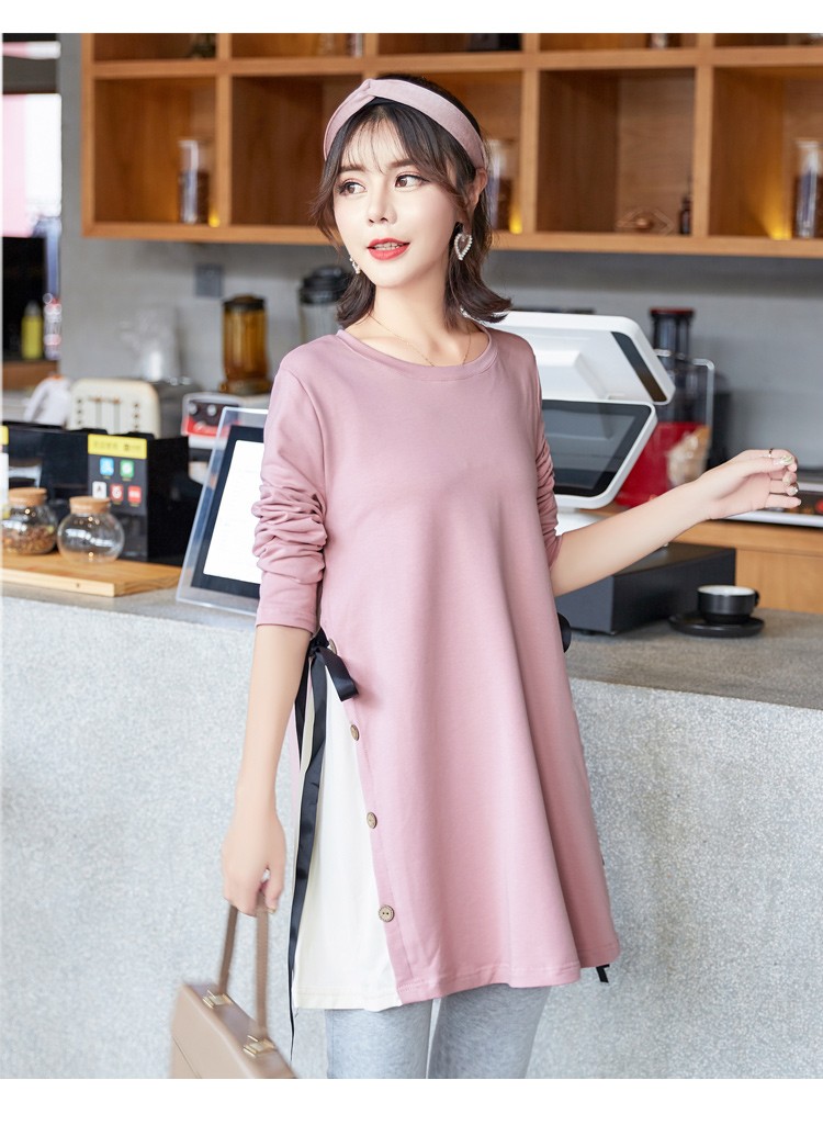 เสื้อยืดคลุมท้องแขนยาวสีชมพู ผ่าข้างและแต่งด้วยกระดุมเก๋ๆ มีสายผูกด้านข้าง ผ้านุ่ม งานสวย ใส่บาย น่ารักมากๆค่ะ