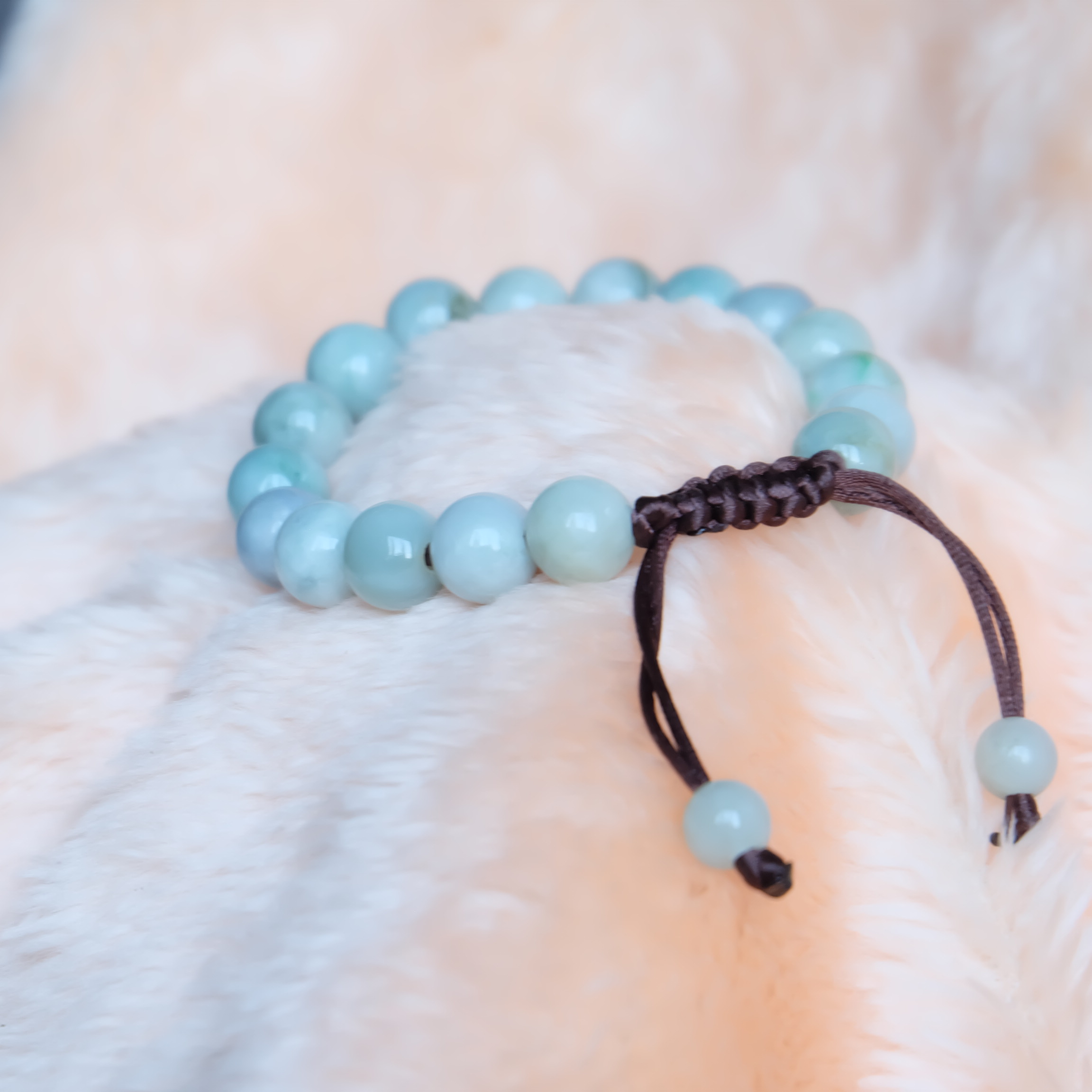 สร้อยข้อมือลูกปัดหยกแท้ 9-11 มิล หยกแท้ หยกพม่า หยกคละสี เชือกดึง รอบข้อมือ 17-19 ซม. มีรอย