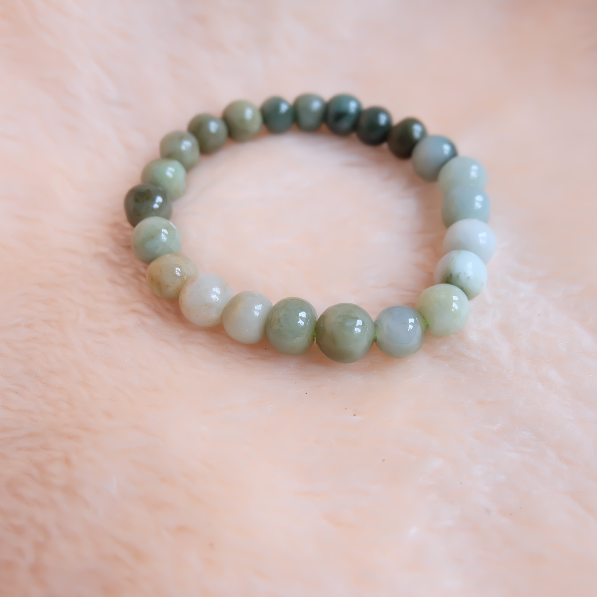สร้อยข้อมือลูกปัดหยกแท้ หยกพม่า หยกคละสี หยกเจไดต์ ขนาด 10 มิล รอบข้อมือ 19 เซนติเมตร ร้อยด้วยไหมยืด ไม่ค่อยกลม