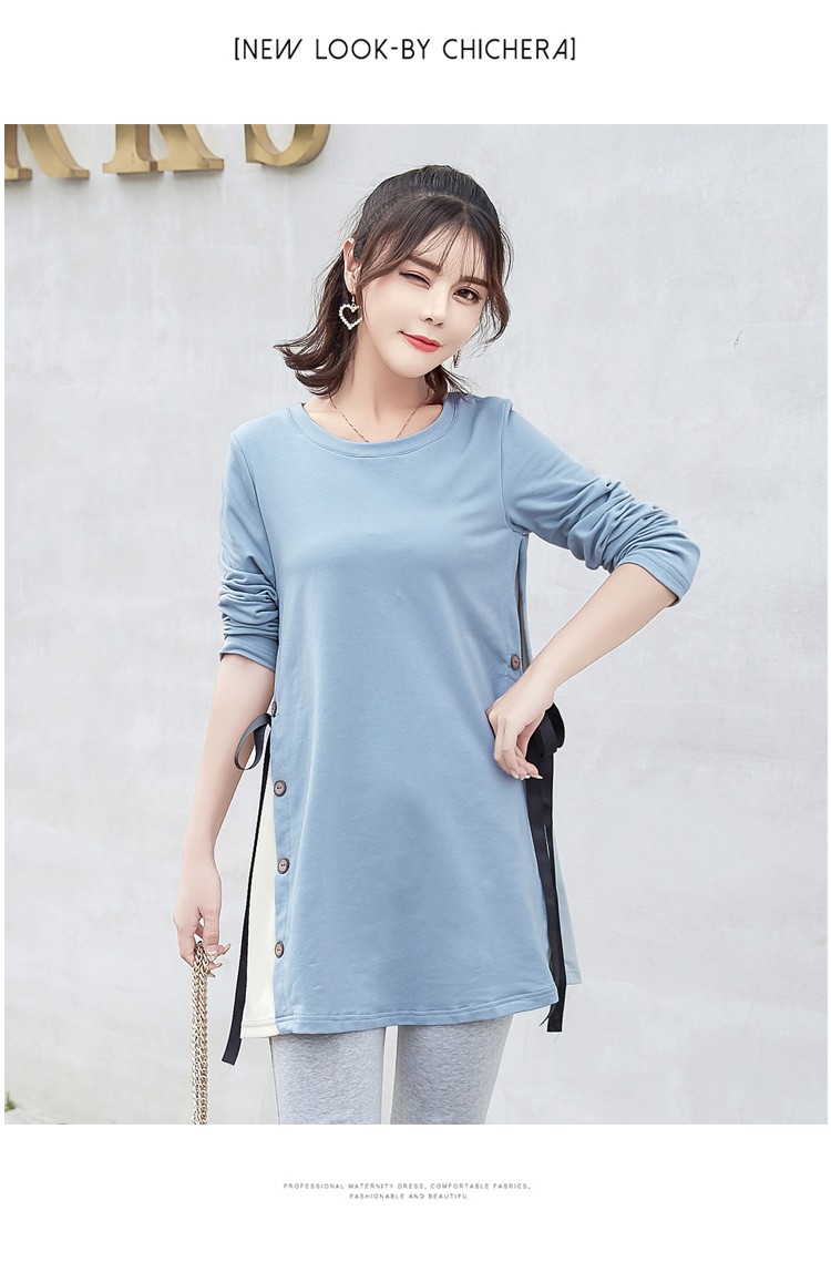 เสื้อยืดคลุมท้องแขนยาวสีเทา ผ่าข้างและแต่งด้วยกระดุมเก๋ๆ มีสายผูกด้านข้าง ผ้านุ่ม งานสวย ใส่บาย น่ารักมากๆค่ะ