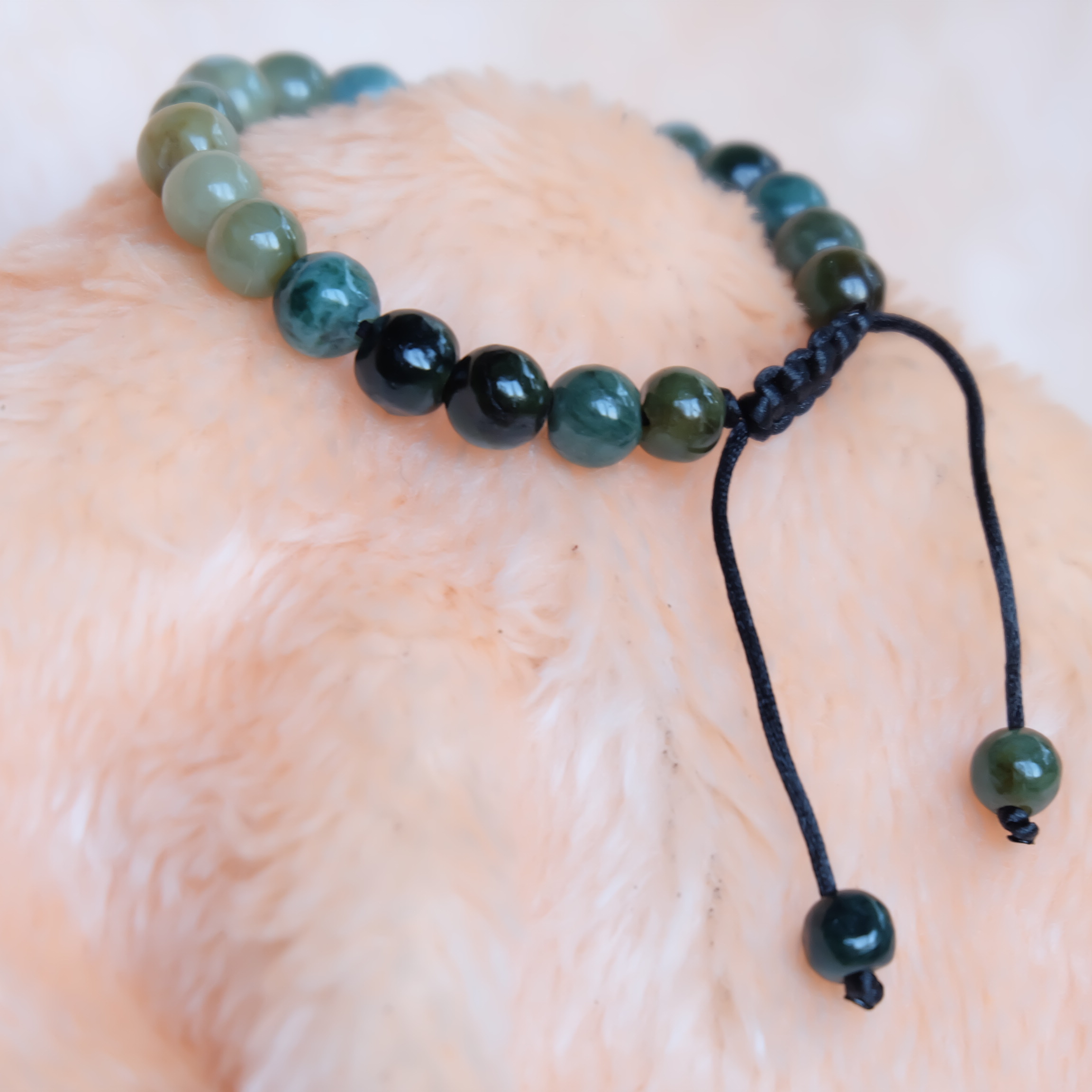 สร้อยข้อมือลูกปัดหยกแท้ 8-9 มิล หยกแท้ หยกพม่า หยกคละสี เชือกดึง รอบข้อมือ 15-17 ซม. มีรอย
