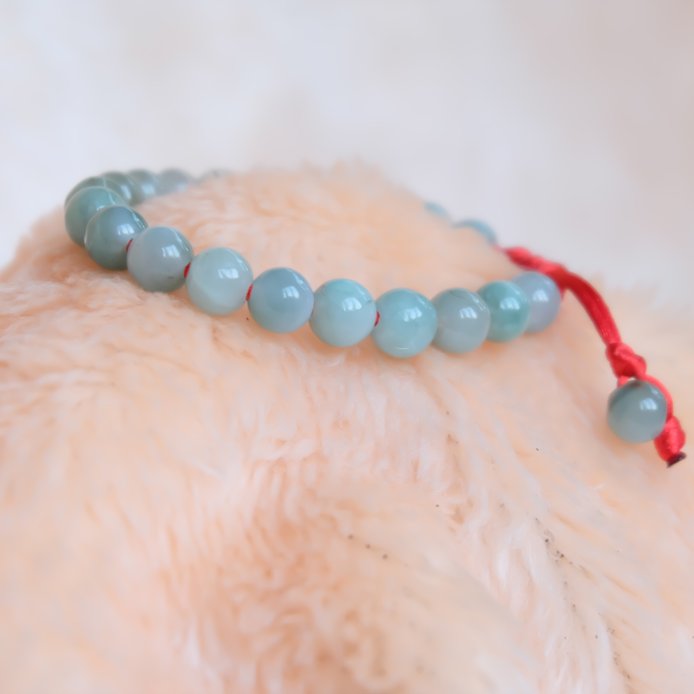 สร้อยข้อมือลูกปัดหยกแท้ 8 มิล หยกแท้ หยกพม่า หยกคละสี เชือกดึง รอบข้อมือ 15-16 ซม. มีรอย