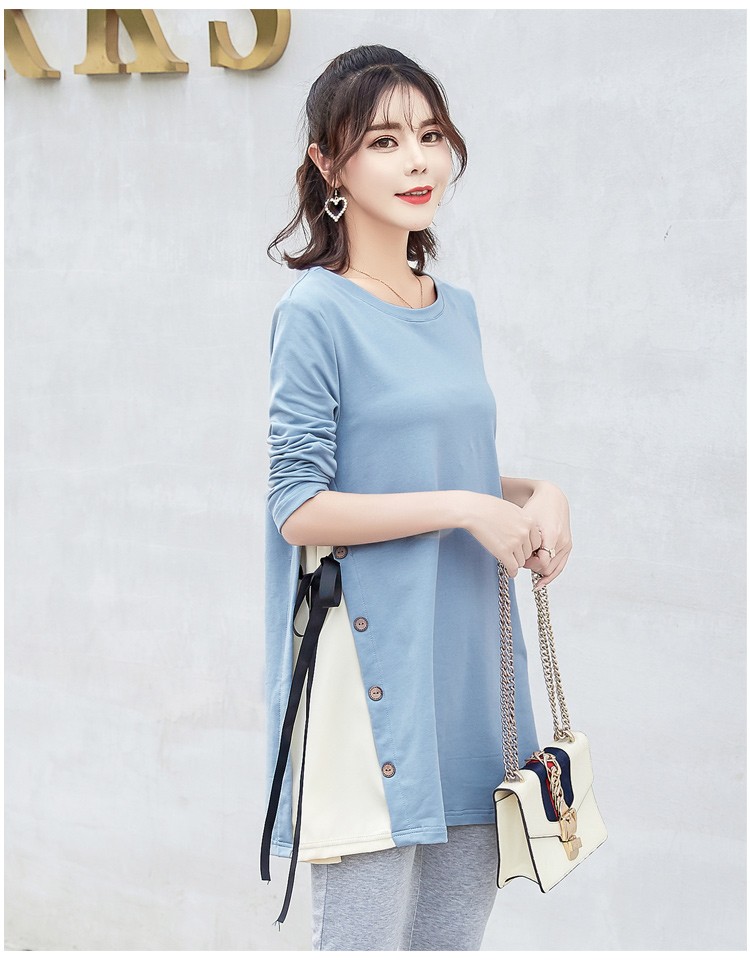 เสื้อยืดคลุมท้องแขนยาวสีเทา ผ่าข้างและแต่งด้วยกระดุมเก๋ๆ มีสายผูกด้านข้าง ผ้านุ่ม งานสวย ใส่บาย น่ารักมากๆค่ะ