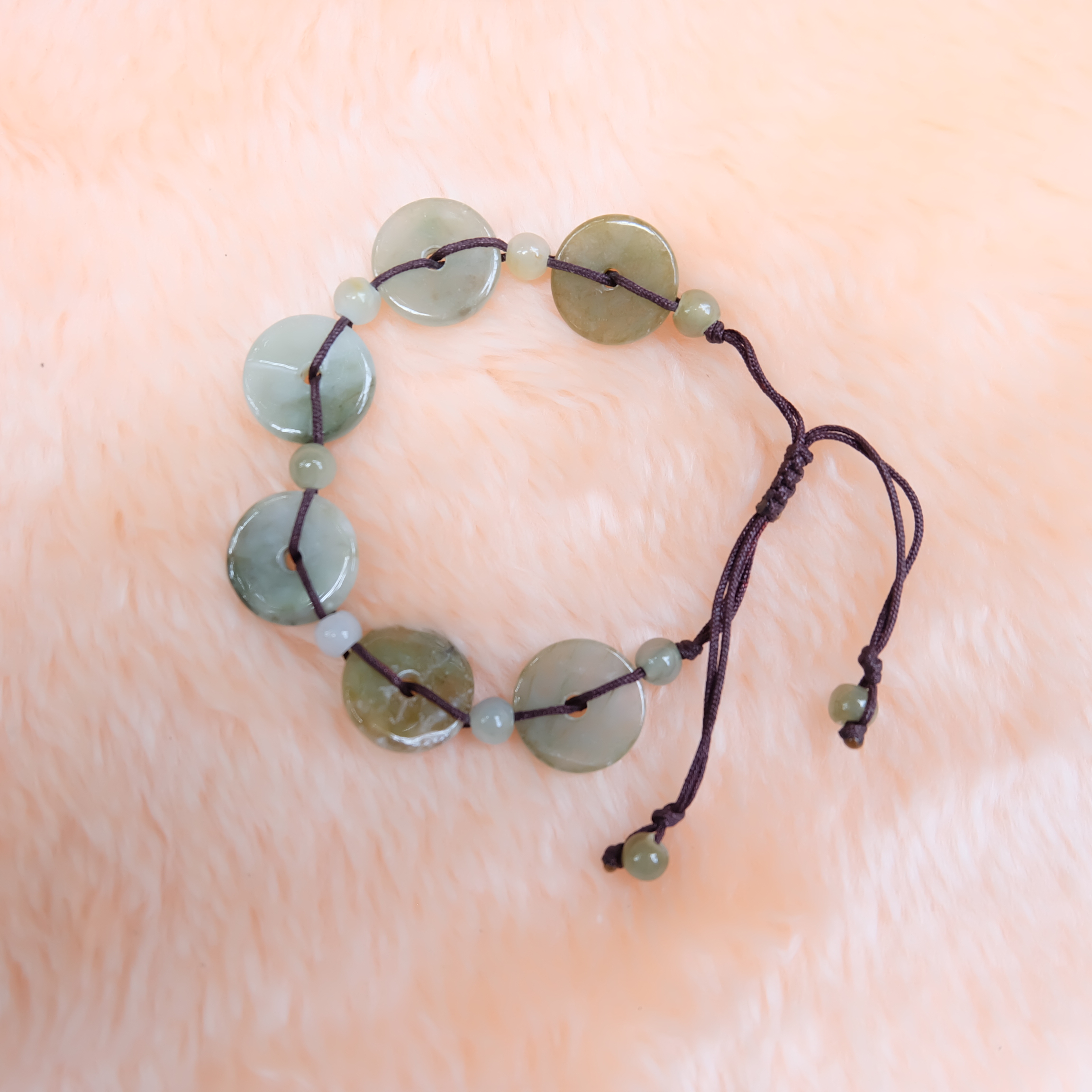 สร้อยข้อมือเหรียญหยกแท้