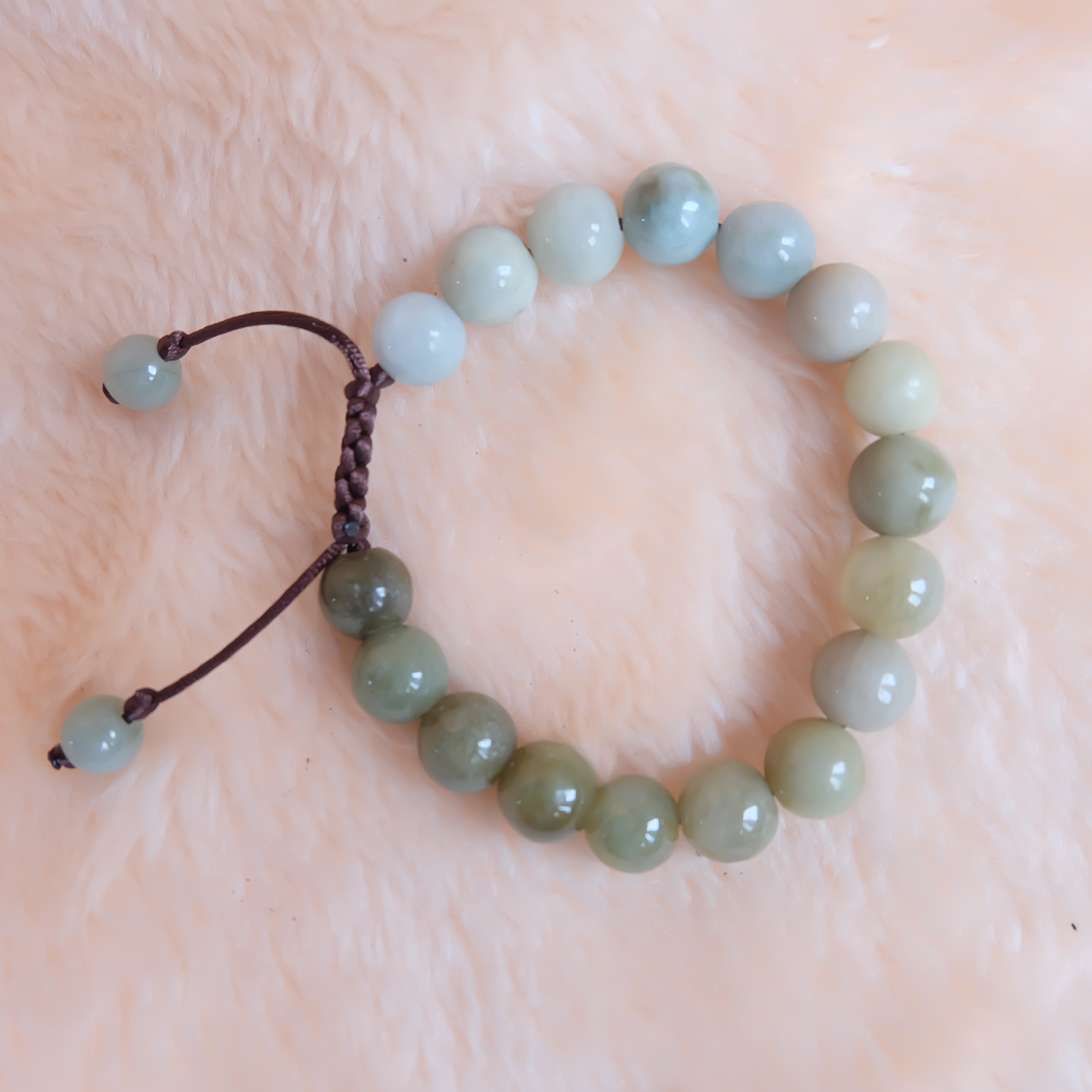 สร้อยข้อมือลูกปัดหยกแท้ 10 มิล หยกแท้ หยกพม่า หยกคละสี เชือกดึง รอบข้อมือ 17-22 ซม.