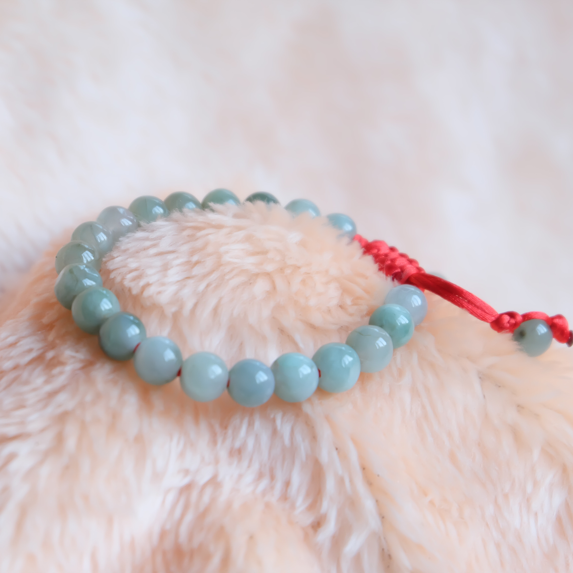สร้อยข้อมือลูกปัดหยกแท้ 8 มิล หยกแท้ หยกพม่า หยกคละสี เชือกดึง รอบข้อมือ 15-16 ซม. มีรอย