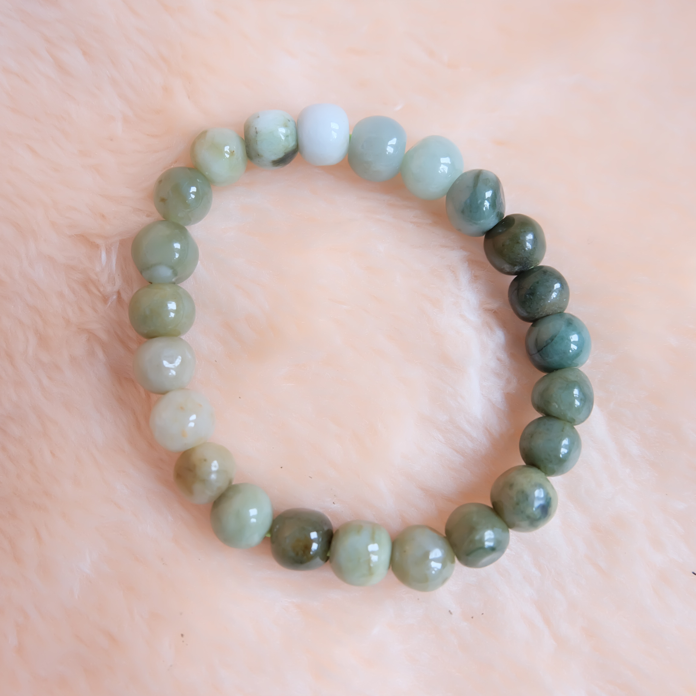 สร้อยข้อมือลูกปัดหยกแท้ หยกพม่า หยกคละสี หยกเจไดต์ ขนาด 10 มิล รอบข้อมือ 19 เซนติเมตร ร้อยด้วยไหมยืด ไม่ค่อยกลม
