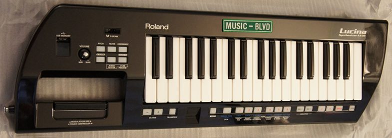 Roland Lucina AX-09 Shoulder Synthesizer (Black Sparkle)