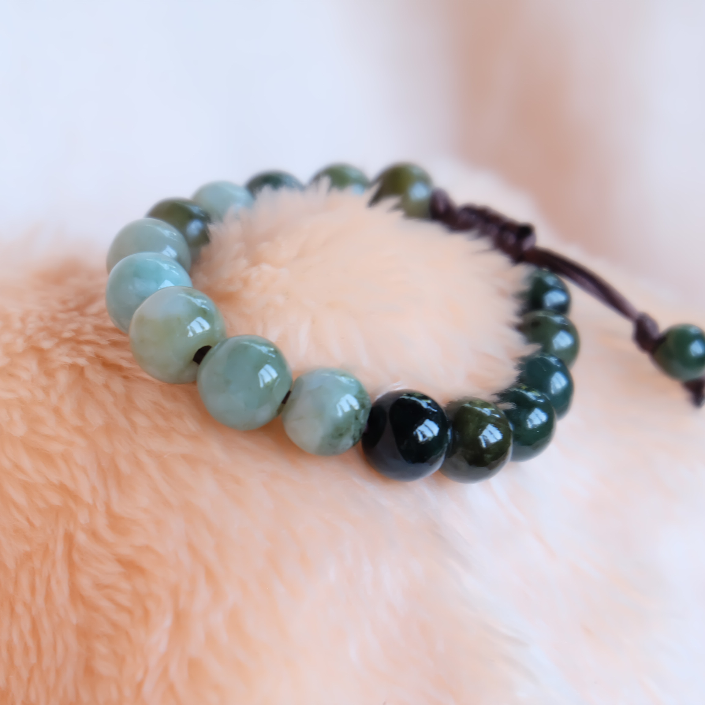 สร้อยข้อมือลูกปัดหยกแท้ 9-11 มิล หยกแท้ หยกพม่า หยกคละสี เชือกดึง รอบข้อมือ 15-16 ซม. มีรอย