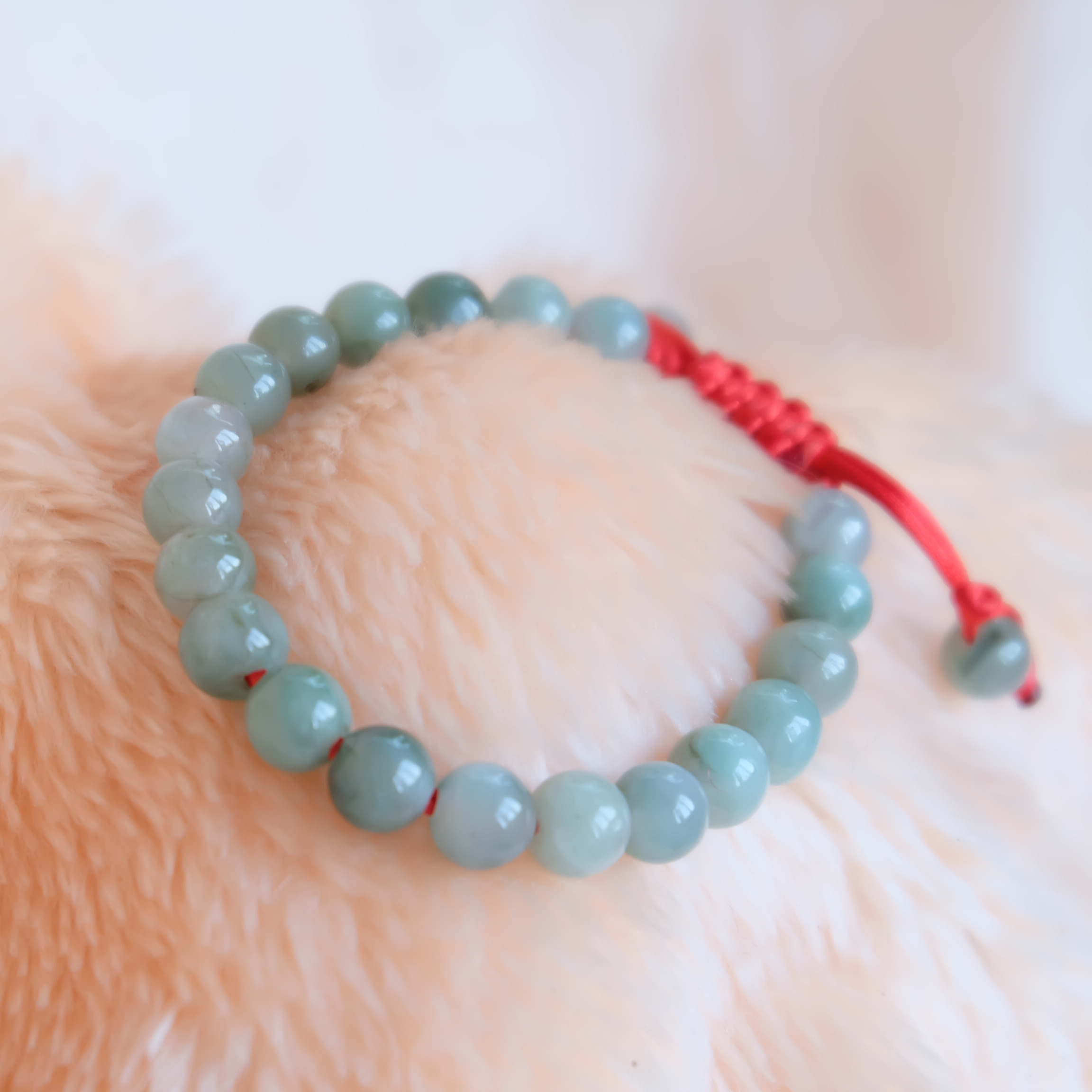 สร้อยข้อมือลูกปัดหยกแท้ 8 มิล หยกแท้ หยกพม่า หยกคละสี เชือกดึง รอบข้อมือ 15-16 ซม. มีรอย