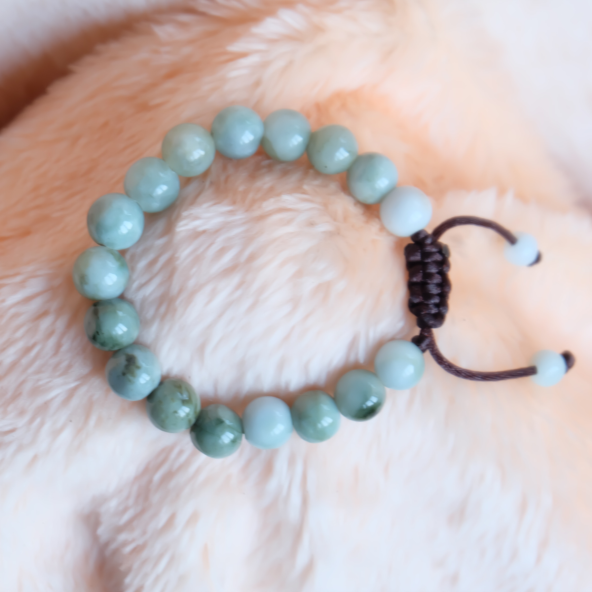 สร้อยข้อมือลูกปัดหยกแท้ 9-11 มิล หยกแท้ หยกพม่า หยกคละสี เชือกดึง รอบข้อมือ 17-19 ซม. มีรอย