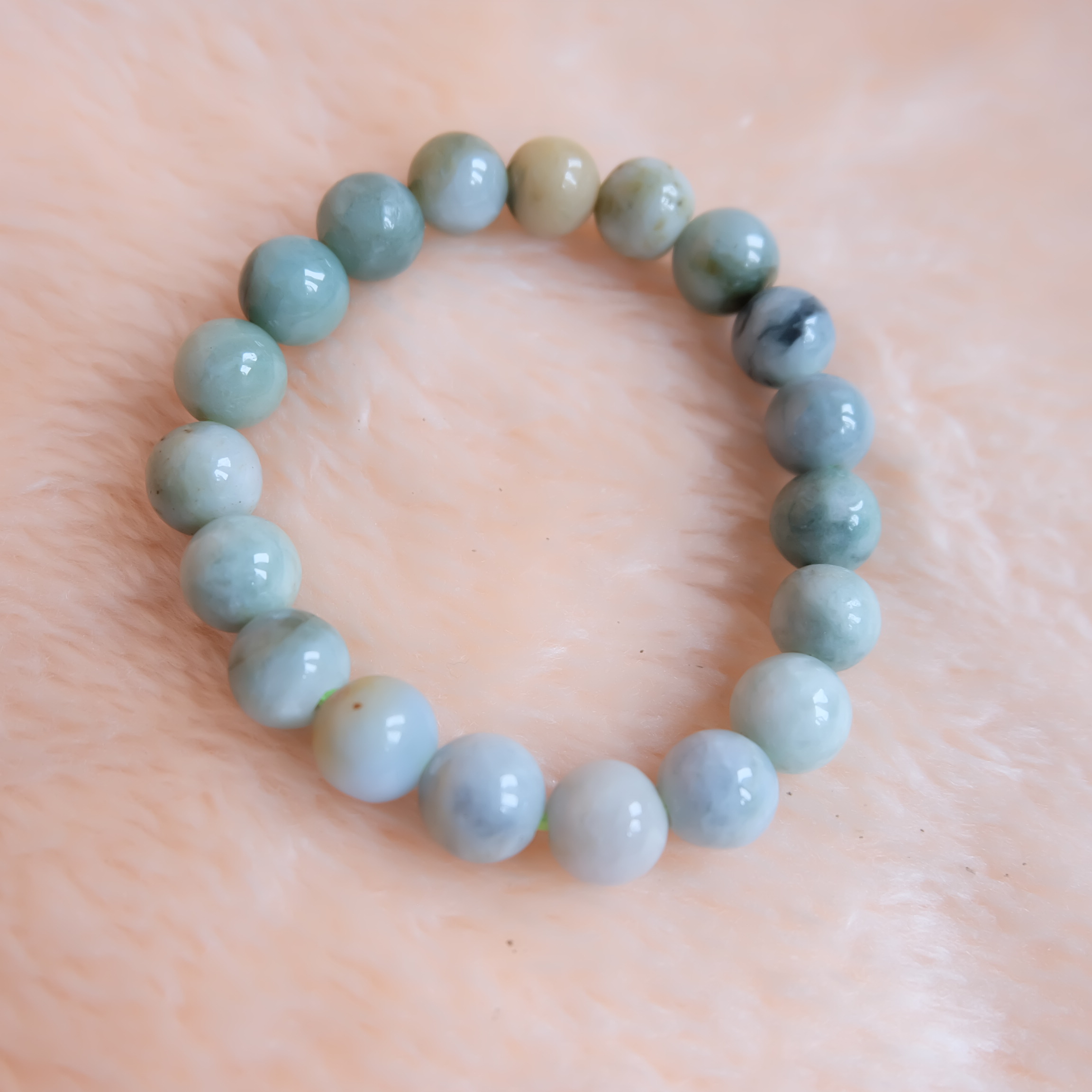 สร้อยข้อมือลูกปัดหยกแท้ หยกพม่า หยกคละสี หยกเจไดต์ ขนาด 10 มิล รอบข้อมือ 16.5 เซนติเมตร ร้อยด้วยไหมยืด ไม่ค่อยกลม