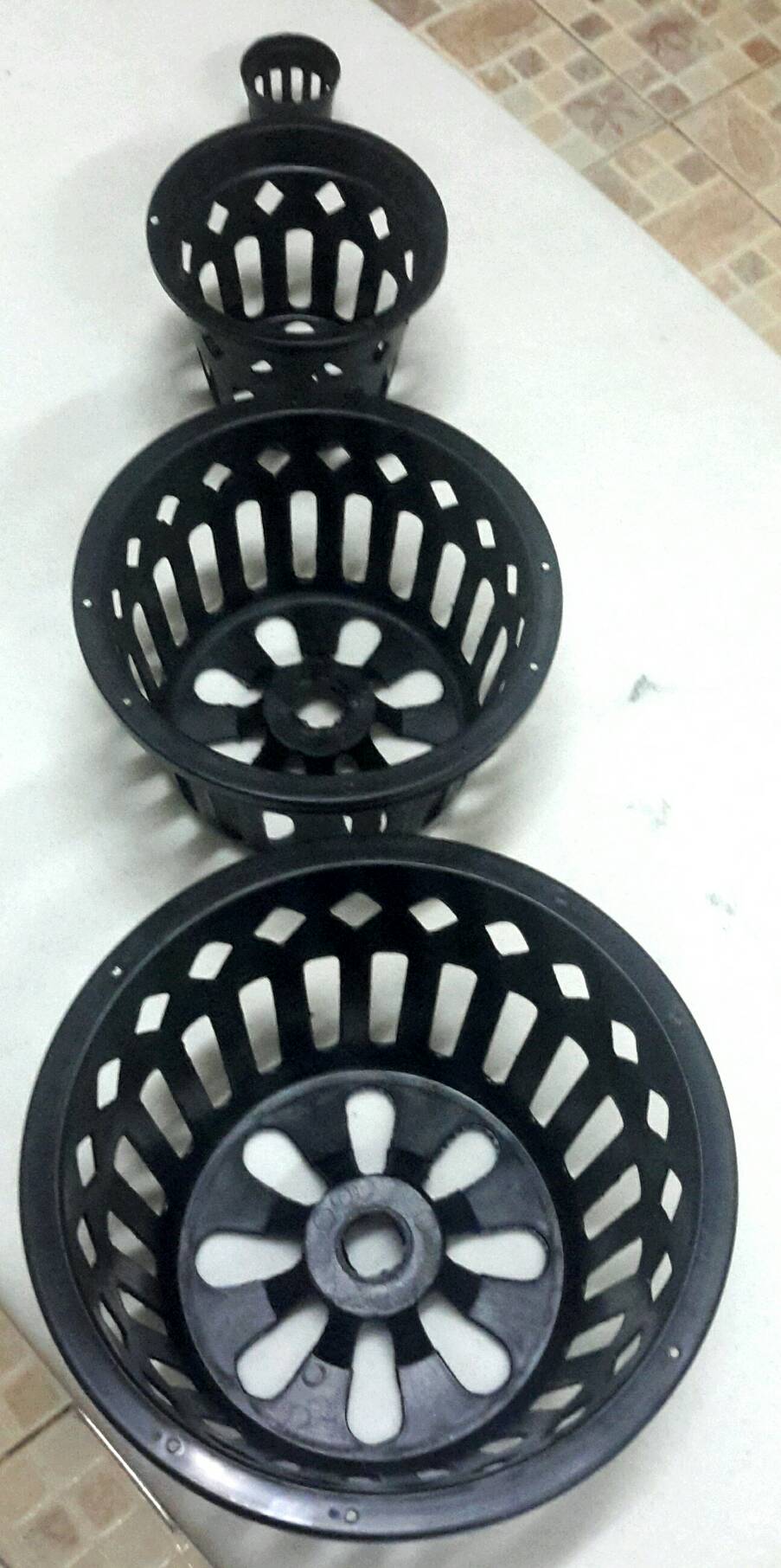 กระถางกล้วยไม้กลมดำโปร่ง ขนาด 4 นิ้ว 600 ใบ / กระสอบ