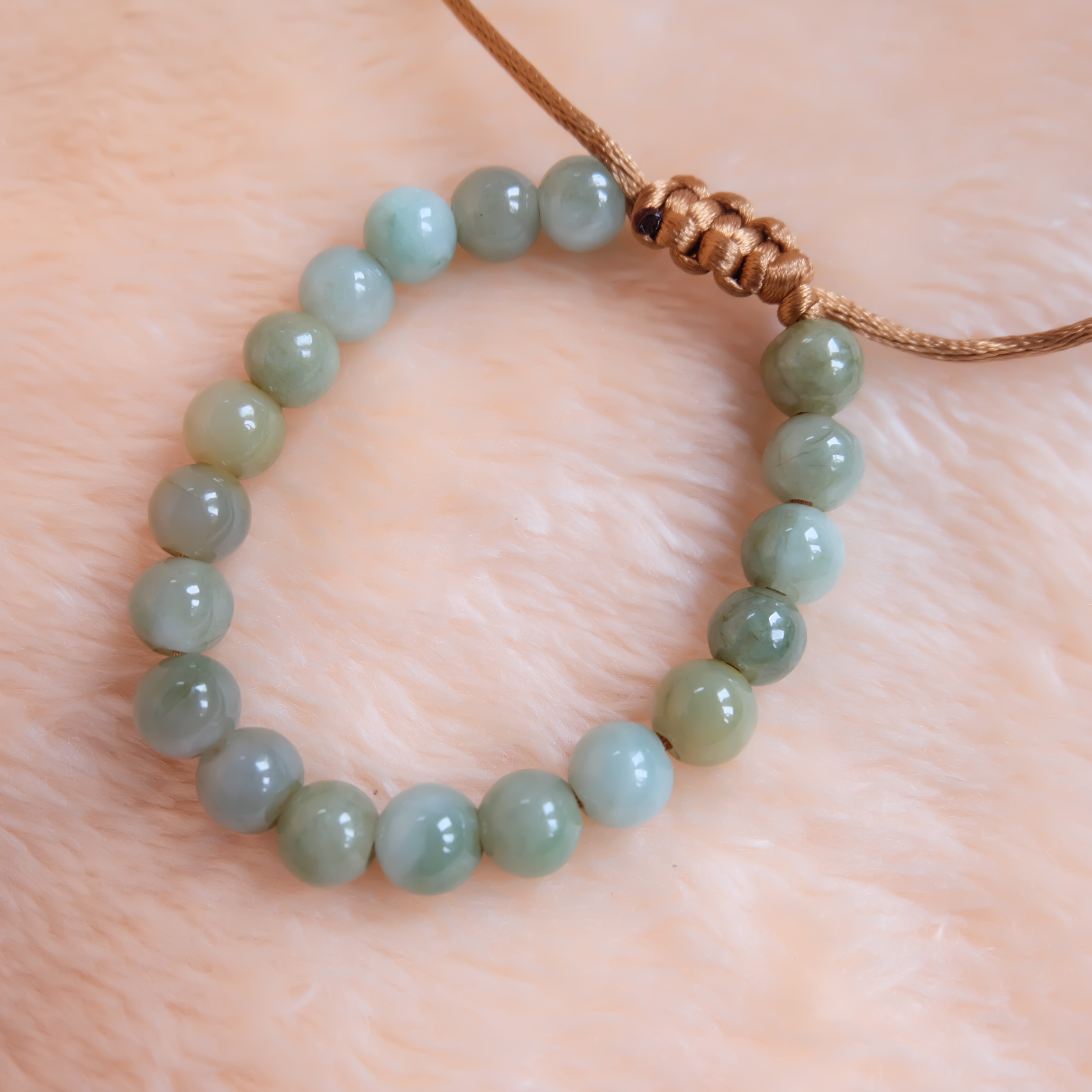 สร้อยข้อมือลูกปัดหยกแท้ 9-11 มิล หยกแท้ หยกพม่า หยกคละสี เชือกดึง รอบข้อมือ 17-19 ซม. มีรอย