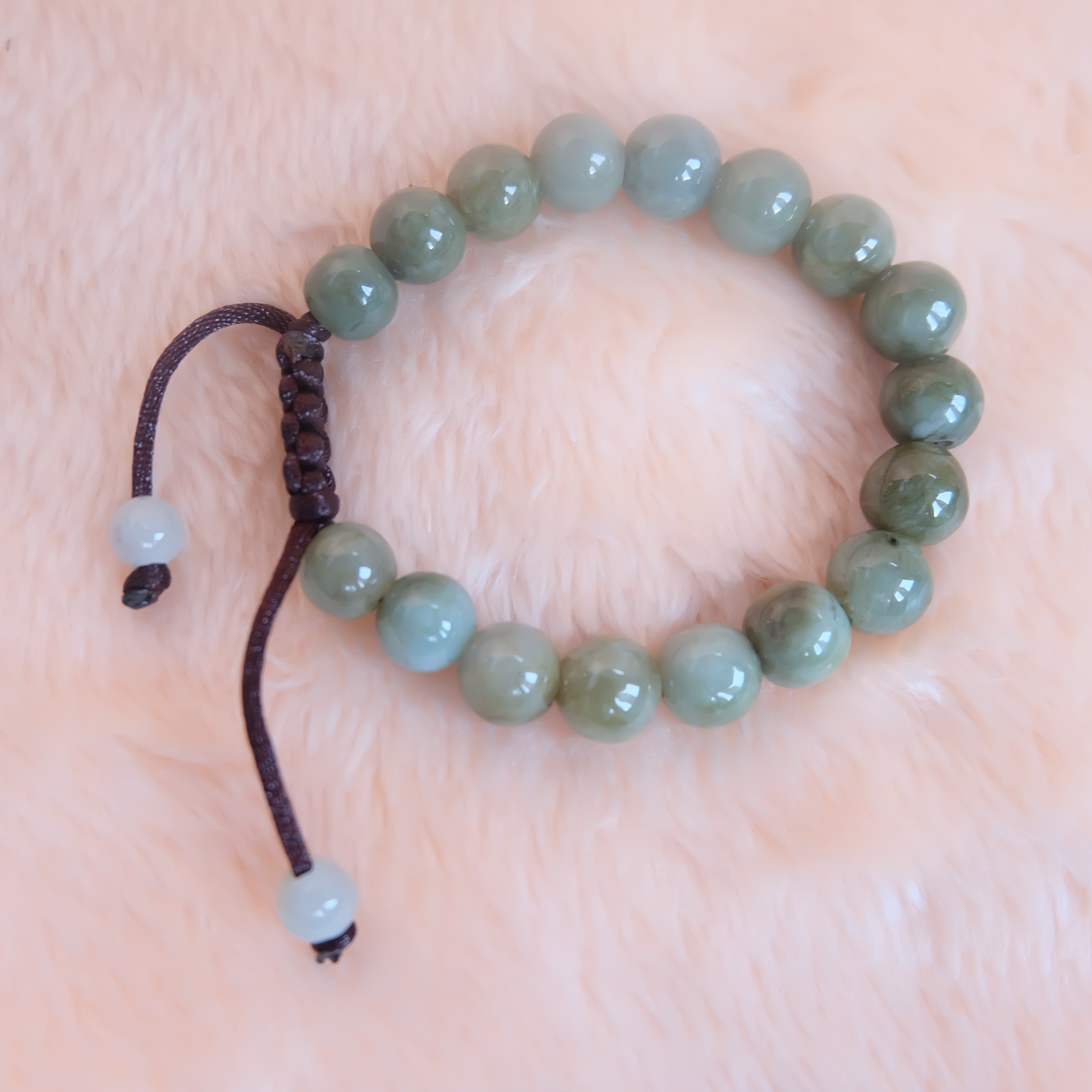 สร้อยข้อมือลูกปัดหยกแท้ 9-11 มิล หยกแท้ หยกพม่า หยกคละสี เชือกดึง รอบข้อมือ 16.5-18 ซม. มีรอย