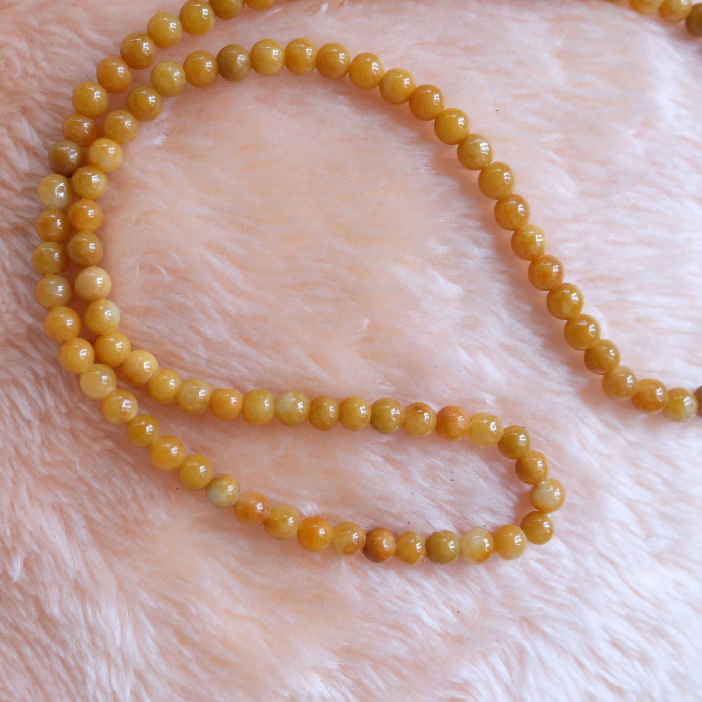 สร้อยคอห้อยพระลูกปัดหยกแท้ สีน้ำผึ้ง ขนาด 4-5 มิล ยาว 24 นิ้ว