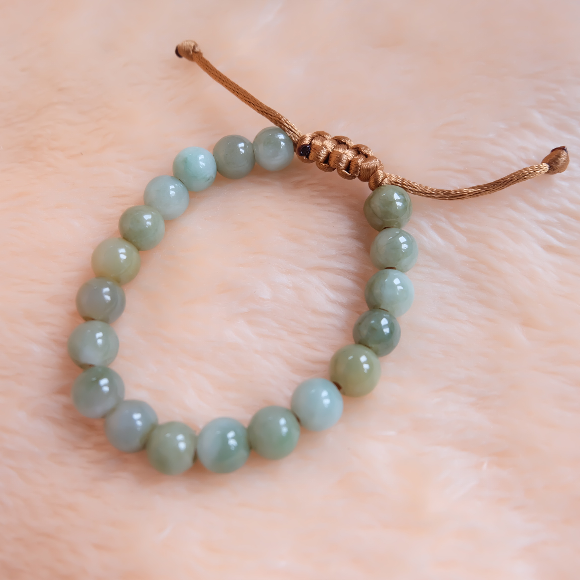 สร้อยข้อมือลูกปัดหยกแท้ 9-11 มิล หยกแท้ หยกพม่า หยกคละสี เชือกดึง รอบข้อมือ 17-19 ซม. มีรอย