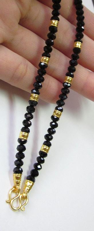 สร้อยคอคริสตัลนิลดำ คั่นทองแท้ 96.5% (ทองครึ่งสลึง)