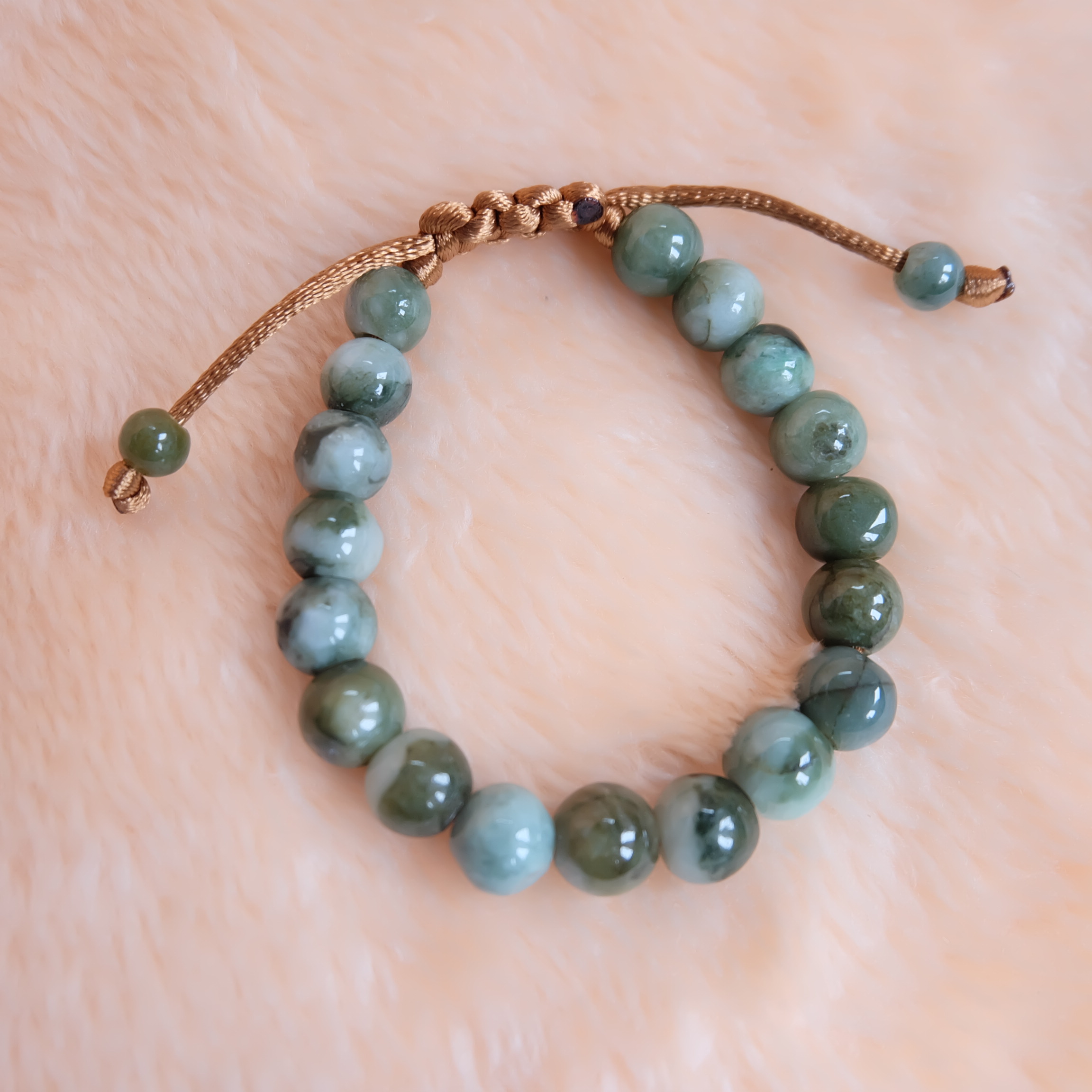 สร้อยข้อมือลูกปัดหยกแท้ 9-11 มิล หยกแท้ หยกพม่า หยกคละสี เชือกดึง รอบข้อมือ 17-19 ซม. มีรอย