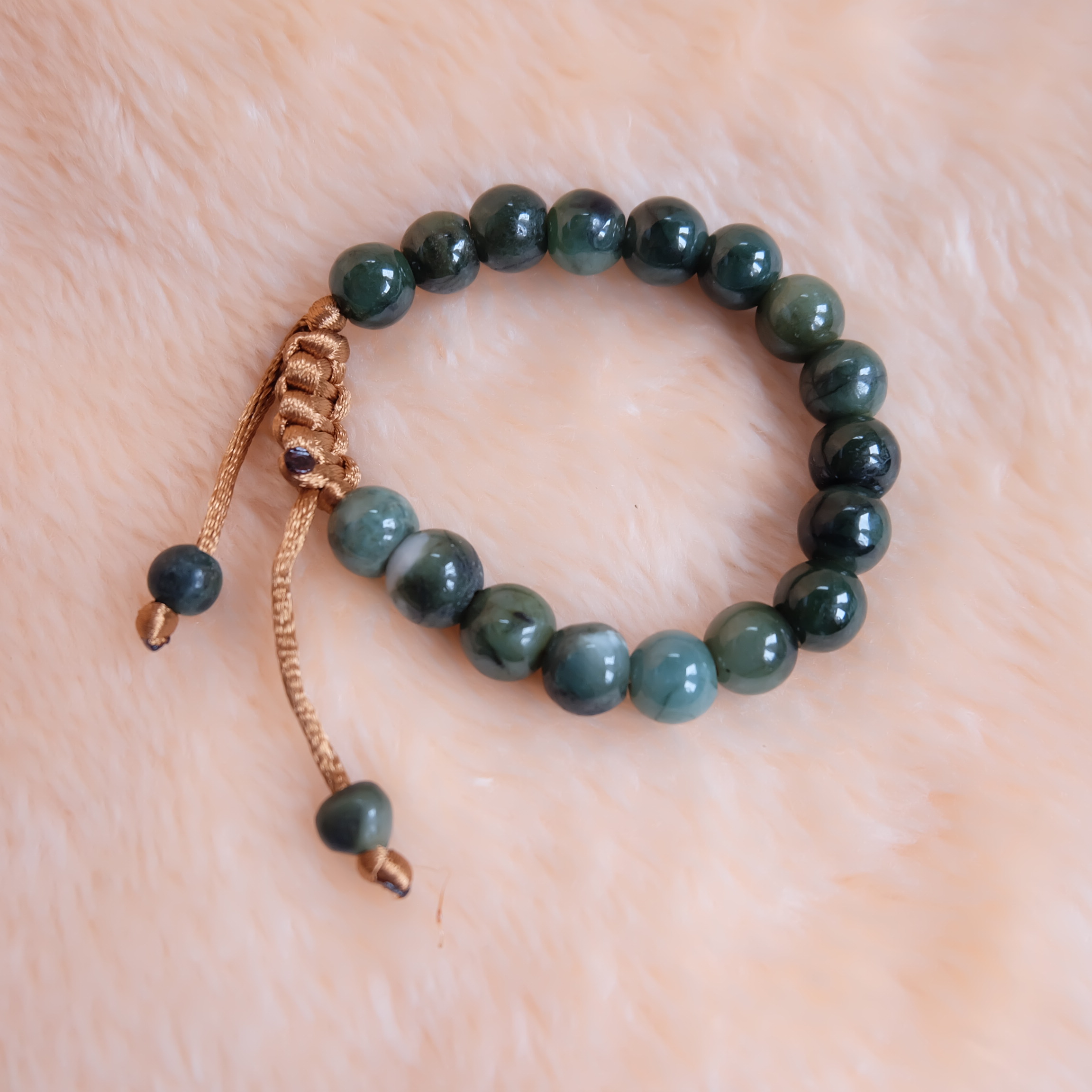 สร้อยข้อมือลูกปัดหยกแท้ 9-11 มิล หยกแท้ หยกพม่า หยกคละสี เชือกดึง รอบข้อมือ 17-19 ซม. มีรอย