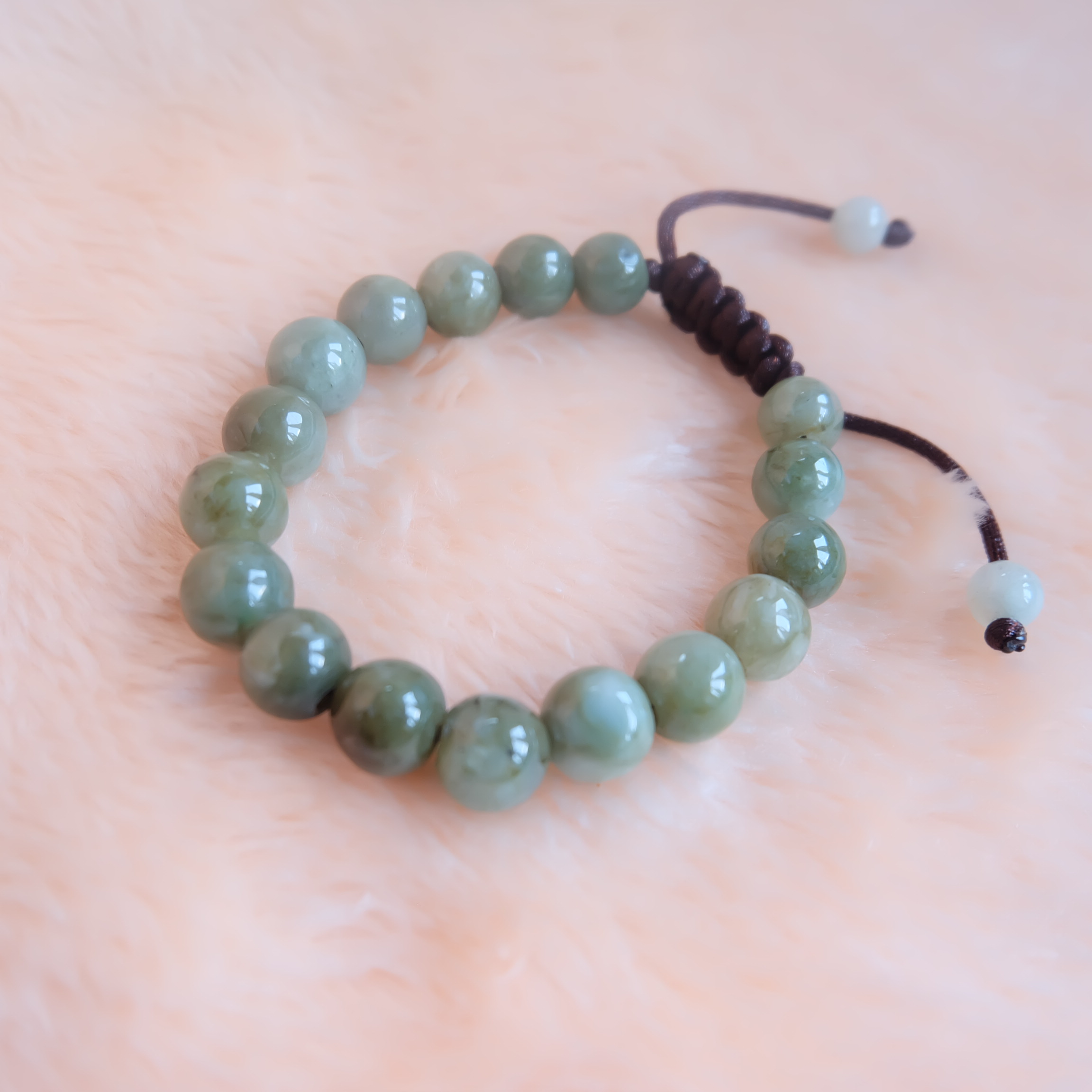 สร้อยข้อมือลูกปัดหยกแท้ 9-11 มิล หยกแท้ หยกพม่า หยกคละสี เชือกดึง รอบข้อมือ 16.5-18 ซม. มีรอย