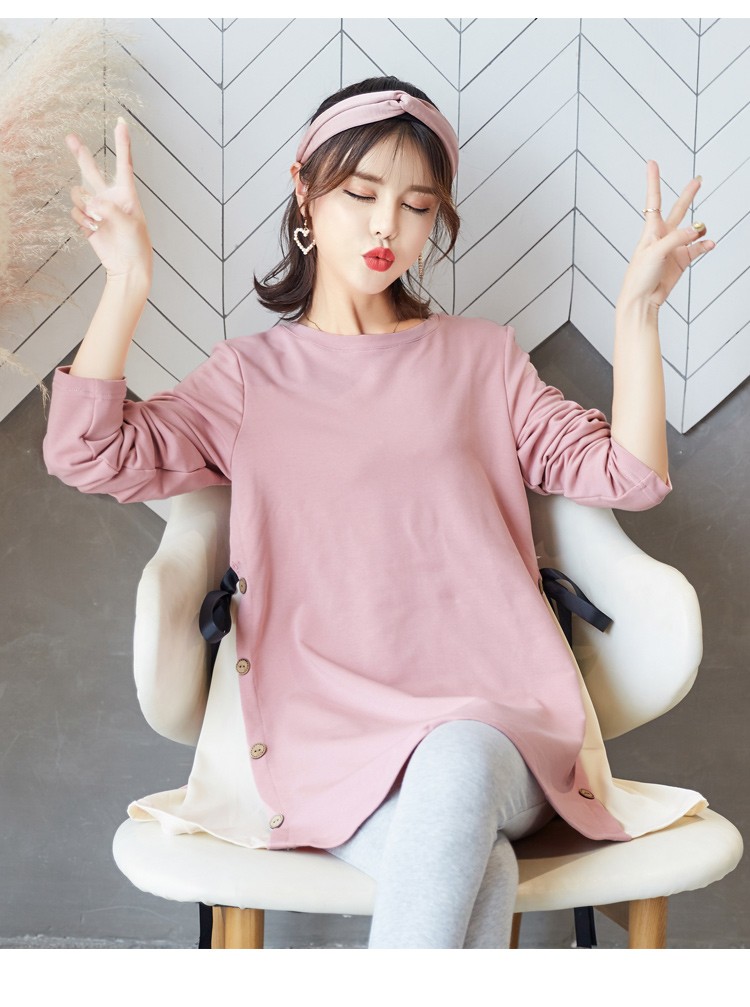 เสื้อยืดคลุมท้องแขนยาวสีชมพู ผ่าข้างและแต่งด้วยกระดุมเก๋ๆ มีสายผูกด้านข้าง ผ้านุ่ม งานสวย ใส่บาย น่ารักมากๆค่ะ