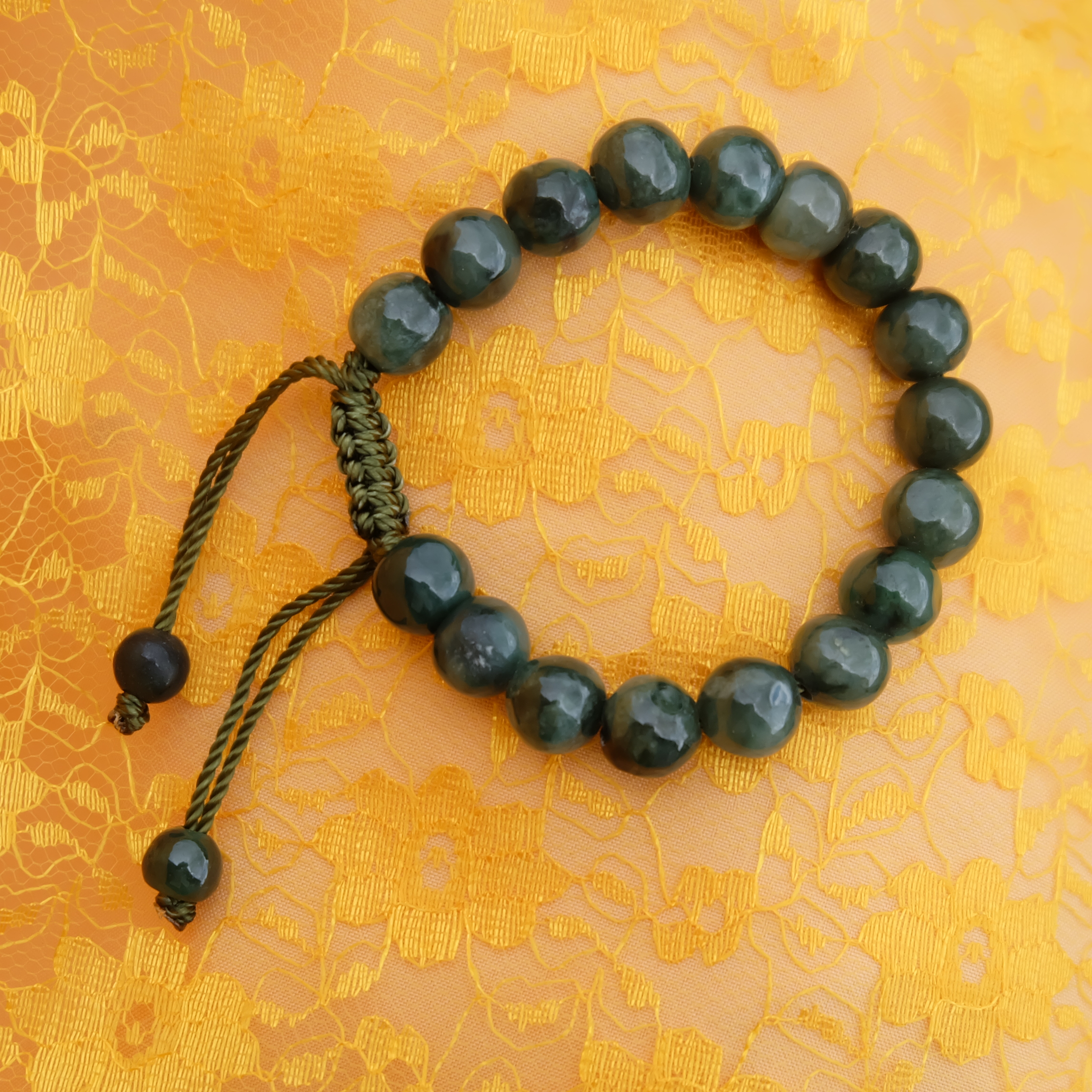 สร้อยข้อมือลูกปัดหยกแท้ 9-10 มิล หยกแท้ หยกพม่า หยกคละสี เชือกดึง รอบข้อมือ 15.5-17 ซม. มีรอย