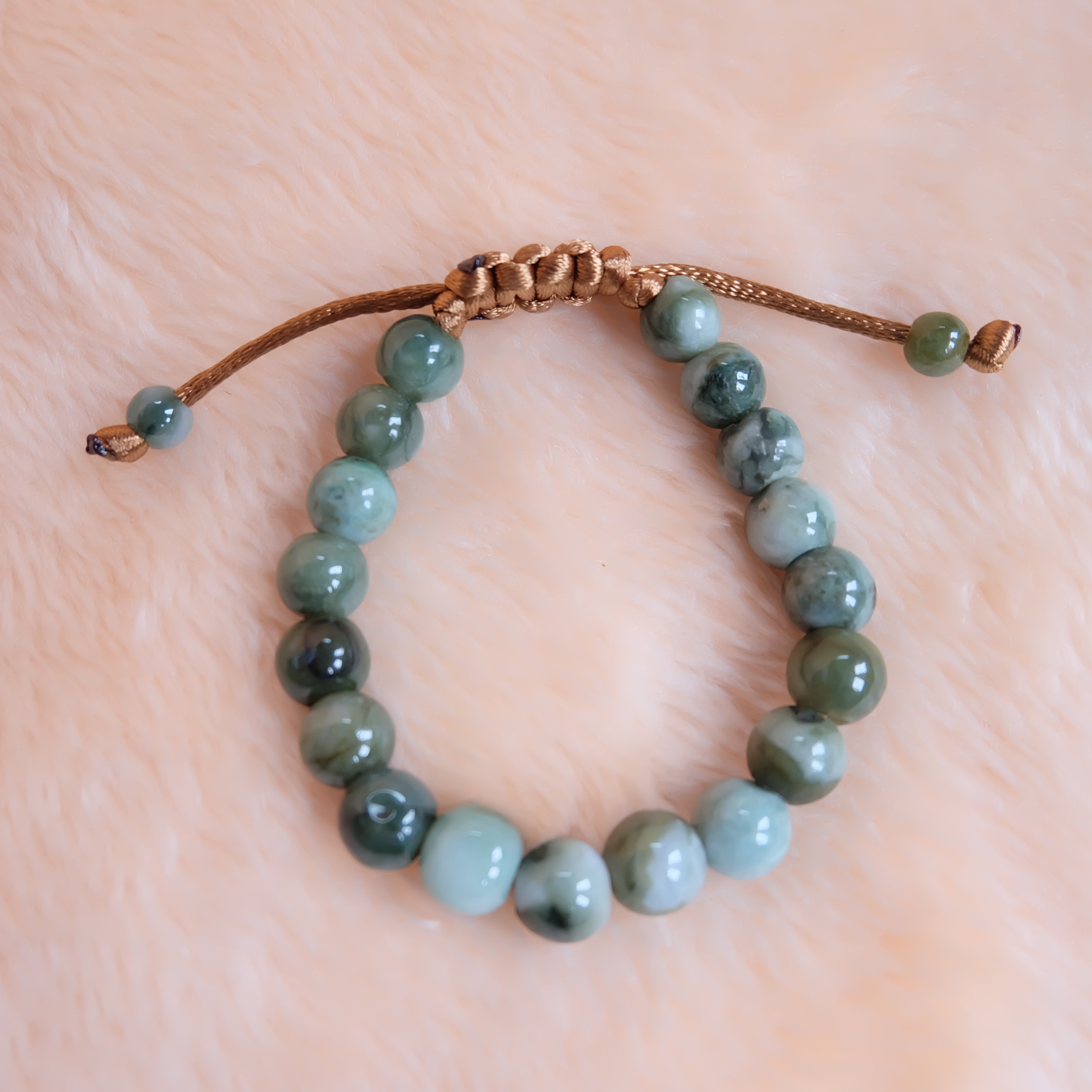สร้อยข้อมือลูกปัดหยกแท้ 9-11 มิล หยกแท้ หยกพม่า หยกคละสี เชือกดึง รอบข้อมือ 17-19 ซม. มีรอย