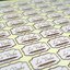 รับทำสติ๊กเกอร์ติดสินค้า ฉลากขนม สติ๊กเกอร์หมู่บ้าน เครื่องสำอาง (Diecut Sticker)